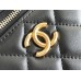 Chanel Vanity Makeup pouch 23A Black with gold hardware, handle, Camellia adjustable buckle, lambskin, 17x10x8cm.