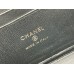 Chanel Vanity Makeup pouch 23A Black with gold hardware, handle, Camellia adjustable buckle, lambskin, 17x10x8cm.