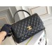 Chanel 23P Coco Handle, medium size 29cm flap bag, black, with stitched edges, gold-tone hardware, caviar leather, Hass Factory leather, 29x18x12cm