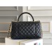 Chanel 23P Coco Handle, medium size 29cm flap bag, black, with stitched edges, gold-tone hardware, caviar leather, Hass Factory leather, 29x18x12cm